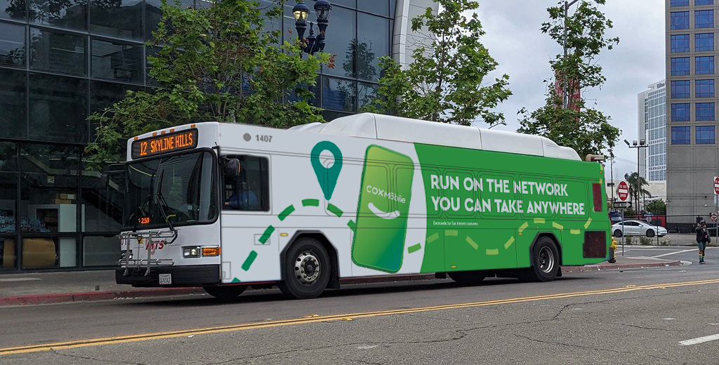 The copy reads: Run on the network you can take anywhere. A dotted lines travels across a map of the US and into a phone.