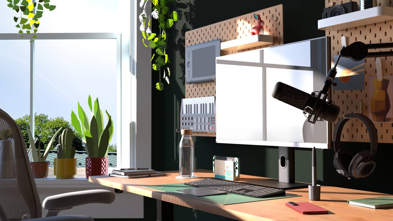 A desk covered in various peices of tech and decorated with plants in the background